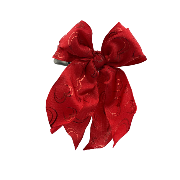 Red tail bow with decorative hearts